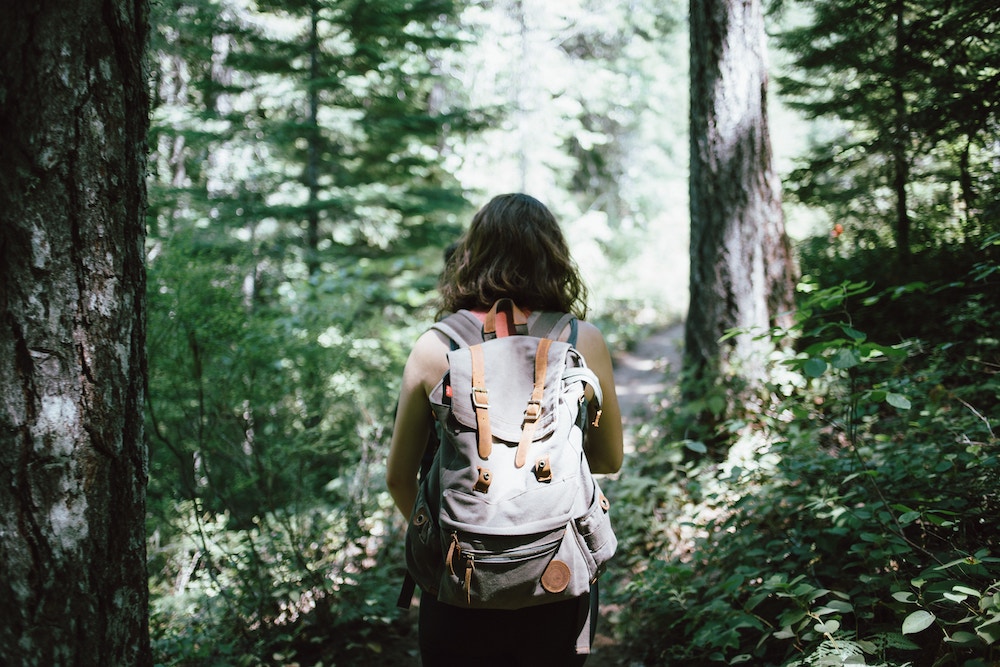 Woman hiking in the woods